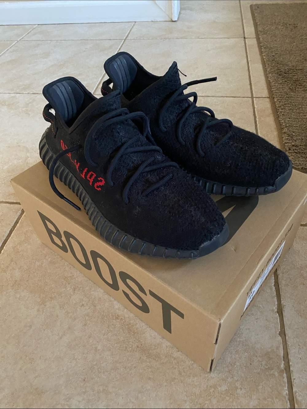 Yeezy Boost 350 V2 Black with Red Stripe Sneakers